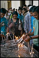 Popular candle burning spot, Basilica of Bom Jesus, Old Goa. Goa, India (color)