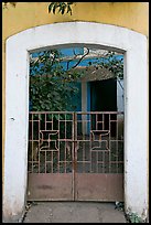 Gate, yard, and house, Panjim. Goa, India