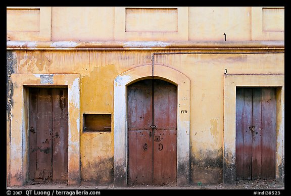 Facade painted yellow, Panjim. Goa, India