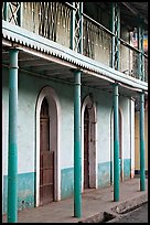 House with balconies painted green, Panjim. Goa, India (color)