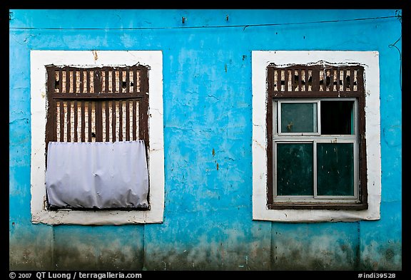 Windows on facade painted blue, Panjim. Goa, India (color)