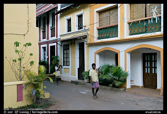 Men returning from work with tools, Panjim. Goa, India (color)