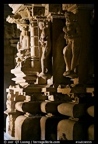 Statues in the corridor (pradakshina), Parsvanatha temple, Eastern Group. Khajuraho, Madhya Pradesh, India (color)