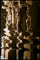 Statues in the corridor (pradakshina), Parsvanatha temple, Eastern Group. Khajuraho, Madhya Pradesh, India (color)