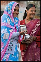 Women with pots used for religious offerings. Khajuraho, Madhya Pradesh, India ( color)