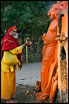 Holy man worshiping Shiva image. Khajuraho, Madhya Pradesh, India ( color)