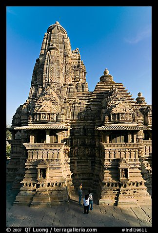 Lakshmana temple seen from Matangesvara temple, with people looking. Khajuraho, Madhya Pradesh, India