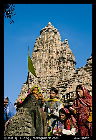 Morning Puja in front of Lakshmana temple. Khajuraho, Madhya Pradesh, India (color)