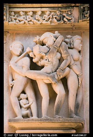 Erotic sculpture of couple in embrace, Lakshmana temple. Khajuraho, Madhya Pradesh, India (color)