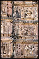 Carvings on the outside of Kadariya-Mahadeva temple including erotic figures. Khajuraho, Madhya Pradesh, India