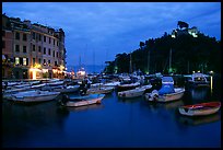 Harbor and San Giorgio castle at dusk, Portofino. Liguria, Italy