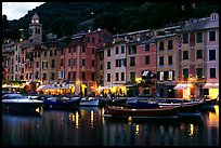 Pastes-colored houses around harbor at dusk, Portofino. Liguria, Italy ( color)