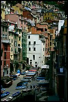 Plazza with parked boats built along steep ravine, Riomaggiore. Cinque Terre, Liguria, Italy