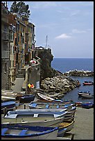 Fishing boats, harbor, and Mediterranean Sea, Riomaggiore. Cinque Terre, Liguria, Italy