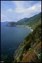 Coast along the Via dell'Amore (Lover's Lane), looking north towards Corniglia. Cinque Terre, Liguria, Italy