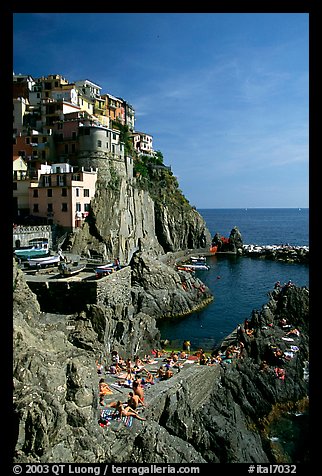 Sunbathers in Manarola. Cinque Terre, Liguria, Italy (color)