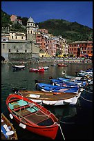 Colorful samll fishing boats in the harbor and main plaza, Vernazza. Cinque Terre, Liguria, Italy (color)