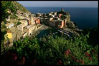 Harbor, church, 11th century castle and village, late afternoon, Vernazza. Cinque Terre, Liguria, Italy (color)