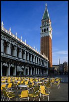 Campanile, Zecca, and empty chairs, Piazza San Marco (Square Saint Mark), early morning. Venice, Veneto, Italy