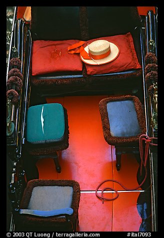 Empty gondola with seats and gondolier's hat. Venice, Veneto, Italy (color)