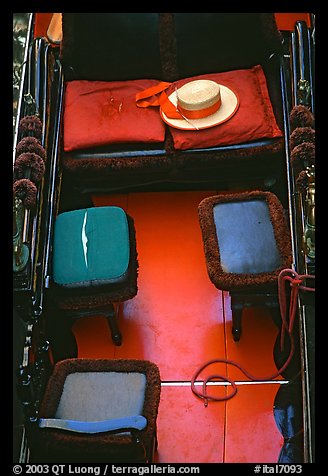 Empty gondola with seats and gondolier's hat. Venice, Veneto, Italy