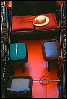 Empty gondola with seats and gondolier's hat. Venice, Veneto, Italy (color)