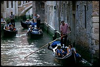 Several gondolas in a narrow canal. Venice, Veneto, Italy (color)