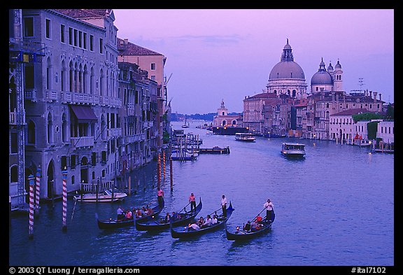 Gondolas, Grand Canal, Santa Maria della Salute church from the Academy Bridge,  sunset. Venice, Veneto, Italy (color)
