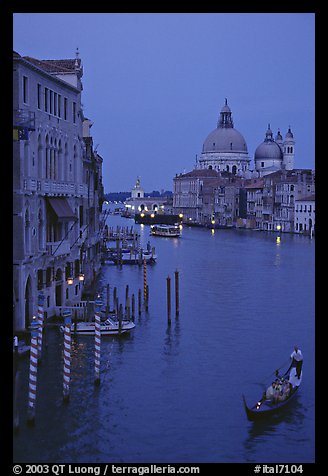 Gondola, Grand Canal, Santa Maria della Salute church from the Academy Bridge, dusk. Venice, Veneto, Italy