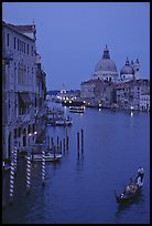 Gondola, Grand Canal, Santa Maria della Salute church from the Academy Bridge, dusk. Venice, Veneto, Italy (color)