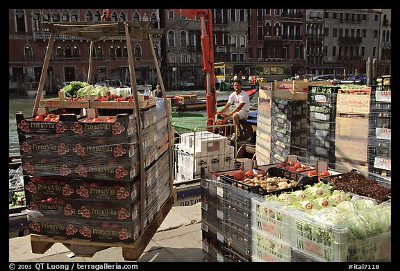Delivery of fresh produce from the Grand Canal. Venice, Veneto, Italy (color)