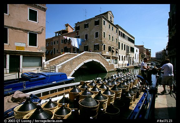 Delivery of wine along a side canal, Castello. Venice, Veneto, Italy