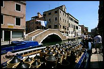 Delivery of wine along a side canal, Castello. Venice, Veneto, Italy ( color)