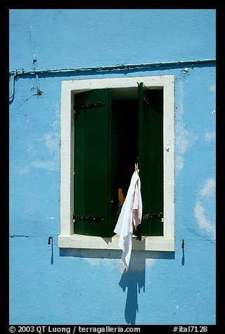 Laundry hanging from a window, Burano. Venice, Veneto, Italy (color)