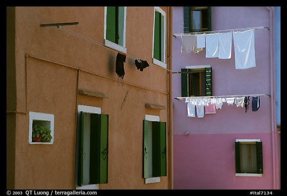 Multicolored houses and hanging laundry, Burano. Venice, Veneto, Italy (color)