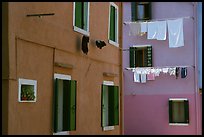 Multicolored houses and hanging laundry, Burano. Venice, Veneto, Italy