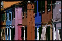 Facades of brightly painted houses, Burano. Venice, Veneto, Italy (color)