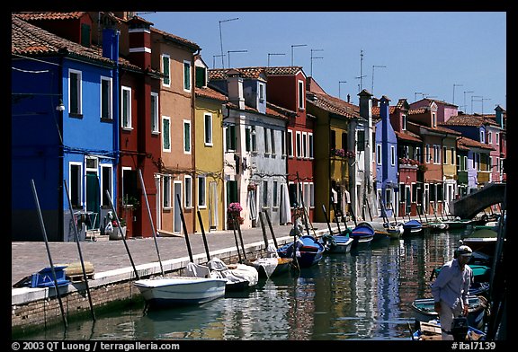 Canal lined with typical brightly painted houses, Burano. Venice, Veneto, Italy (color)