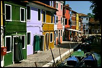 Canal bordered by multicolored  houses, Burano. Venice, Veneto, Italy