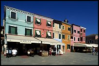 Street with brightly painted houses, Burano. Venice, Veneto, Italy