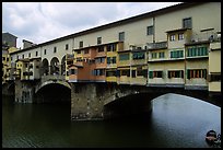 Ponte Vecchio (1345),  old bridge lined with shops. Florence, Tuscany, Italy (color)