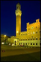Piazza Del Campo, Palazzo Pubblico, and Torre del Mangia  at night. Siena, Tuscany, Italy
