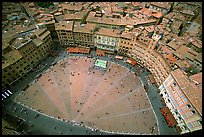 The square paving divided into nine sectors, representing members of the Coucil of Nine.. Siena, Tuscany, Italy