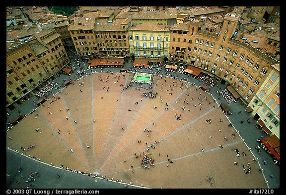 Medieval Piazza Del Campo with paving divided into nine sectors to represent Council of Nine.. Siena, Tuscany, Italy (color)