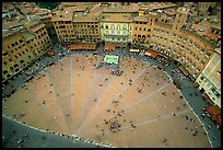 Medieval Piazza Del Campo with paving divided into nine sectors to represent Council of Nine.. Siena, Tuscany, Italy