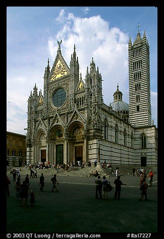 Richly decorated cathedral facade, afternoon. Siena, Tuscany, Italy