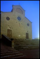 Duomo at dawn in the fog. San Gimignano, Tuscany, Italy (color)