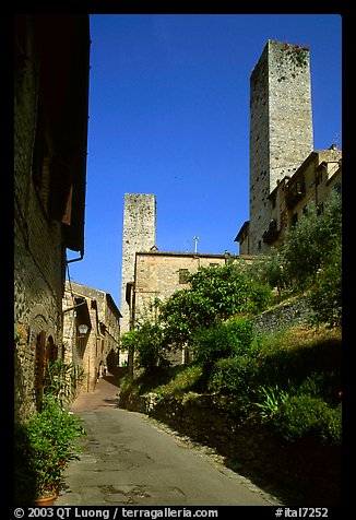 Street dominated by medieval towers. San Gimignano, Tuscany, Italy (color)