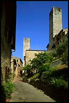 Street dominated by medieval towers. San Gimignano, Tuscany, Italy (color)