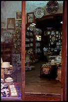 Woman painting plates in a ceramic store. Orvieto, Umbria ( color)